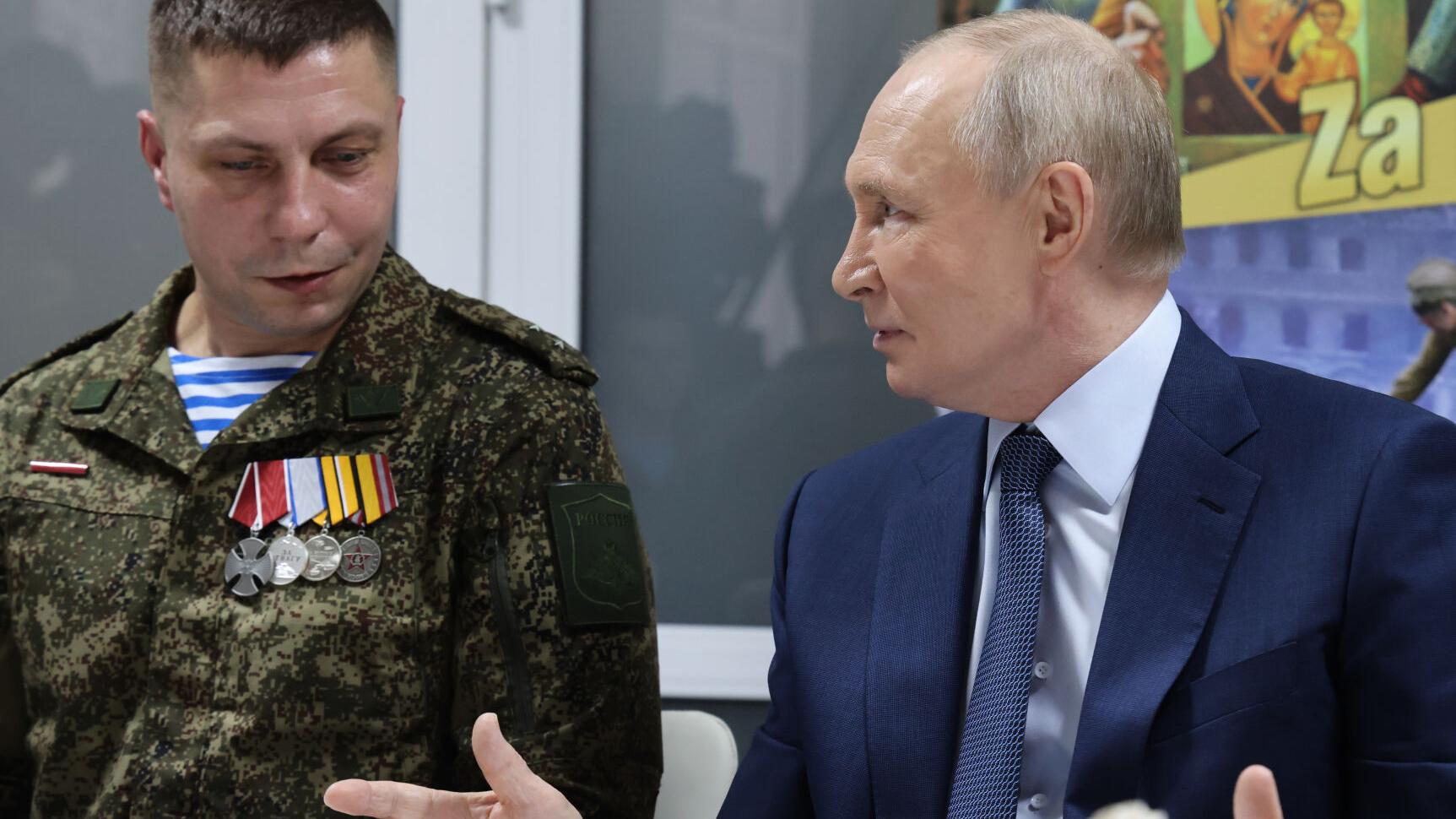 Putin claims Russian troops have surrounded 2 Ukrainian cities but Ukraine says that's not true